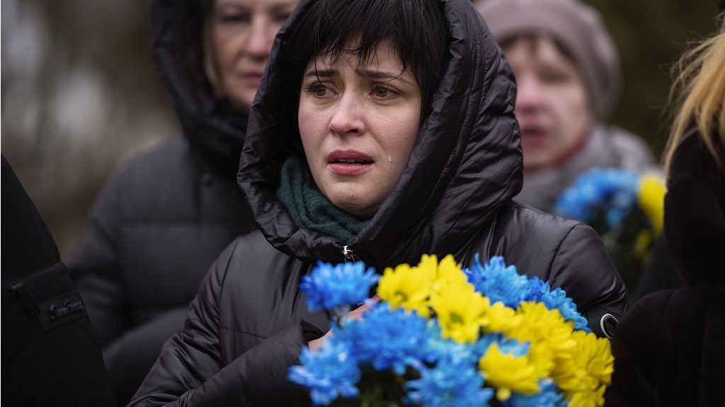 Tears, defiance and new tanks in Ukraine for war anniversary