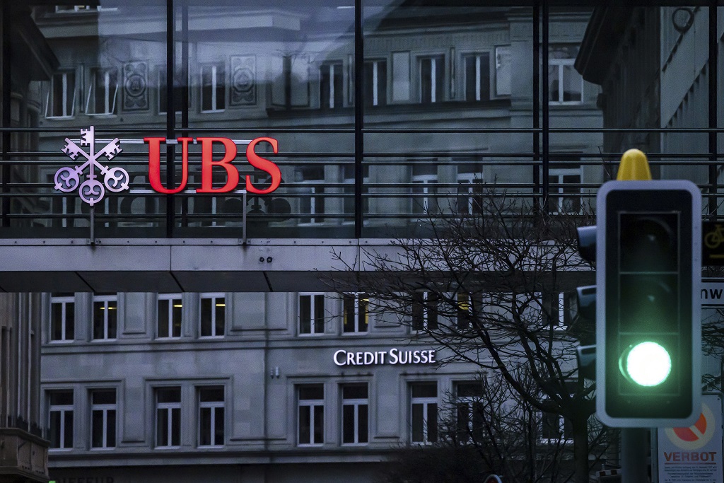 Deal for UBS to buy Credit Suisse sends shares tumbling
