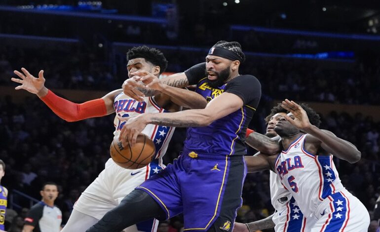 Davis,  James lead 4th-quarter charge as the Lakers hold off 76ers