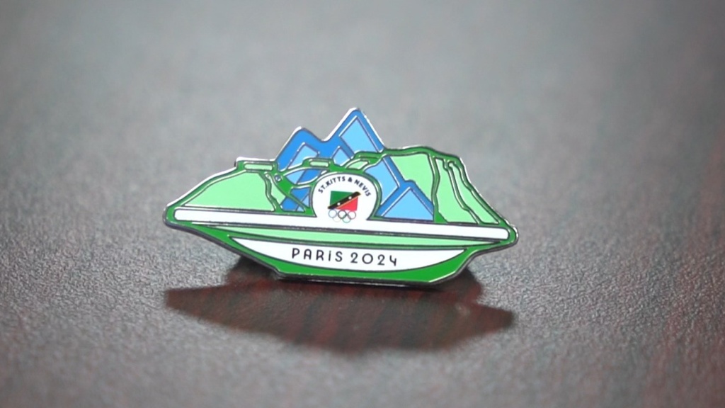 Artist Dennis Richards creates Olympic pin for St Kitts and Nevis
