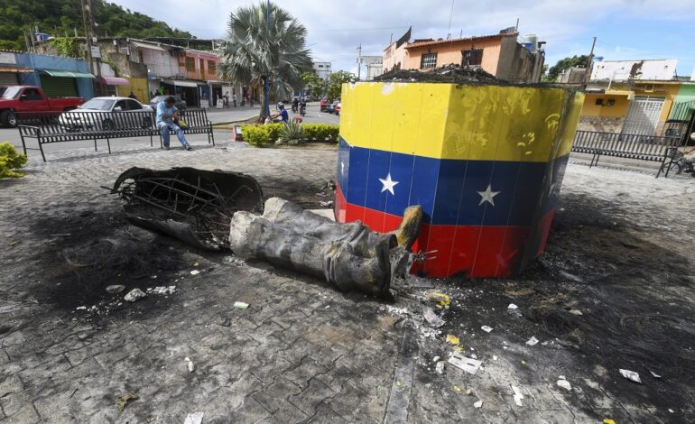 Hugo Chávez statues targeted across Venezuela in post-election unrest